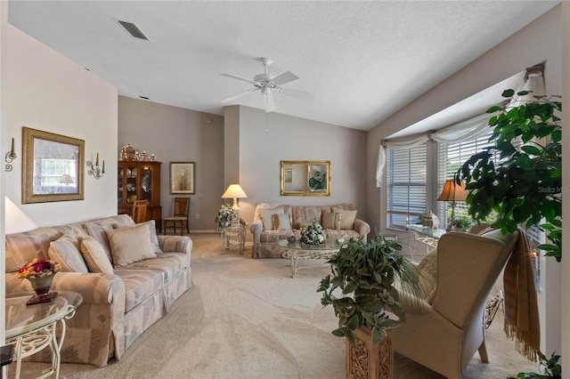 6608 Borg, Leesburg, FL 34748 - carpeted living area featuring visible vents, a ceiling fan, and lofted ceiling
