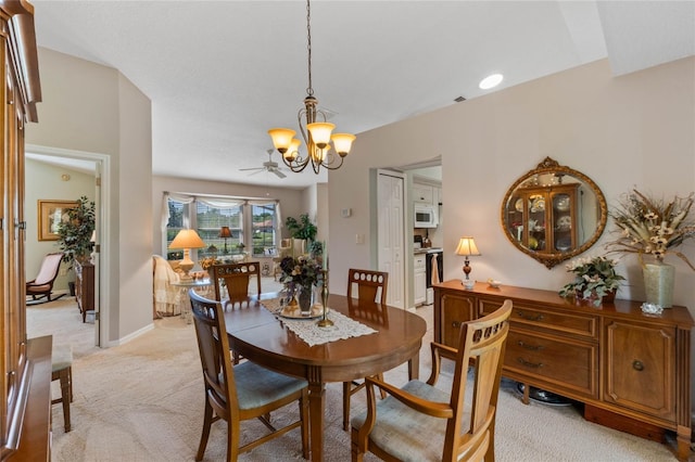 6608 Borg, Leesburg, FL 34748 - dining area with baseboards, an inviting chandelier, and light carpet