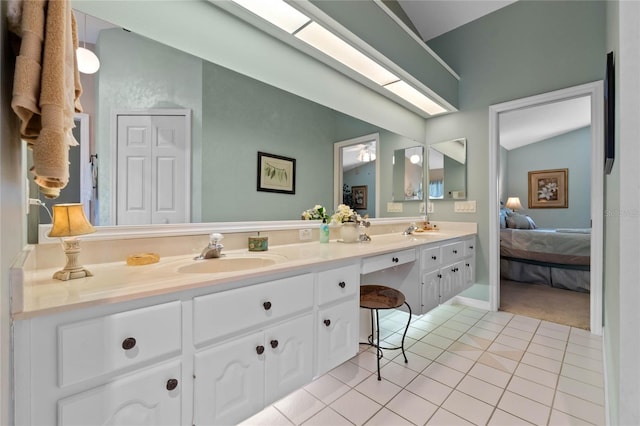 6608 Borg, Leesburg, FL 34748 - ensuite bathroom featuring a sink, tile patterned floors, double vanity, and connected bathroom