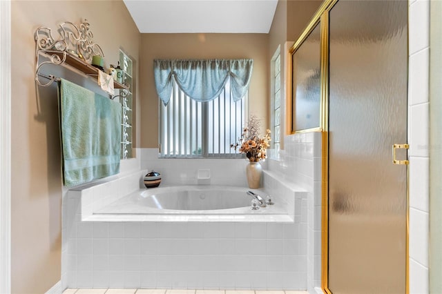 6608 Borg, Leesburg, FL 34748 - bathroom featuring a bath and a stall shower