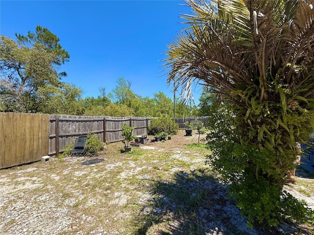 view of yard featuring a fenced backyard