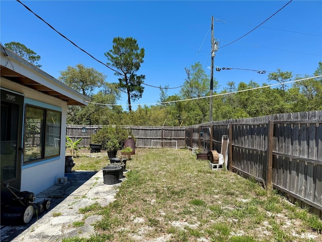 view of yard featuring a fenced backyard