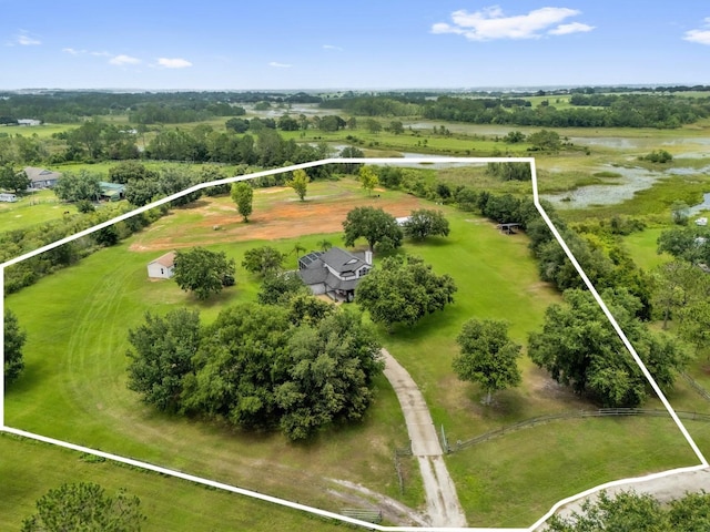 10901 Island Grove Rd, Clermont, FL 34711 - aerial view of sparsely populated area featuring property boundaries highlighted and a large body of water