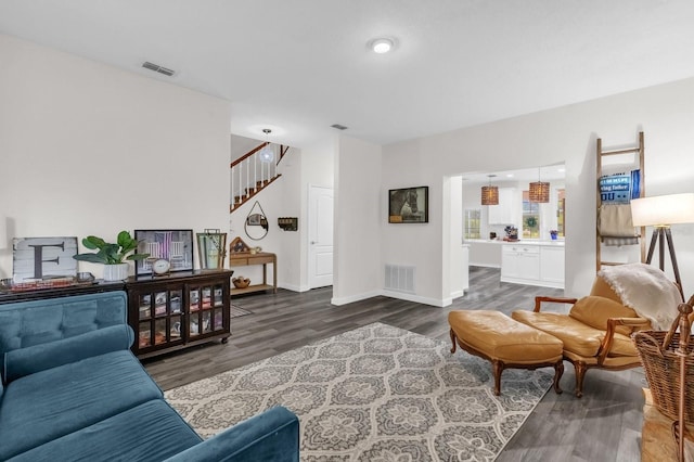 10901 Island Grove Rd, Clermont, FL 34711 - living room with dark wood finished floors and stairway
