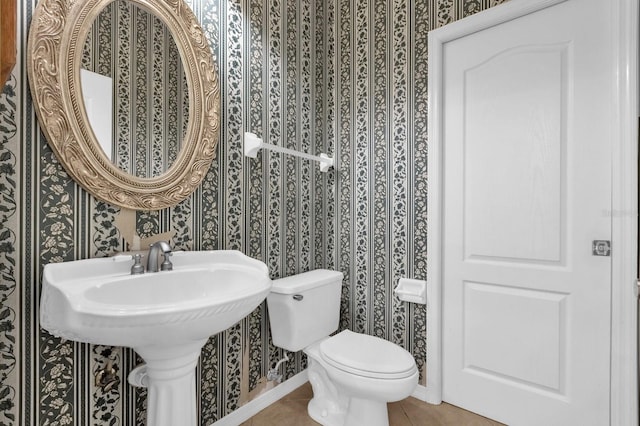 10901 Island Grove Rd, Clermont, FL 34711 - bathroom with wallpapered walls and tile patterned floors