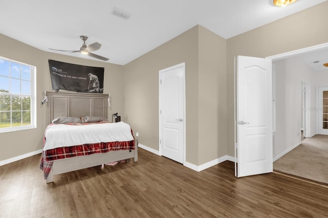 10901 Island Grove Rd, Clermont, FL 34711 - bedroom featuring wood finished floors and a ceiling fan
