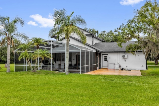 10901 Island Grove Rd, Clermont, FL 34711 - rear view of house featuring a patio area, a lawn, roof with shingles, and a lanai