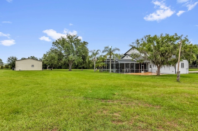 10901 Island Grove Rd, Clermont, FL 34711 - view of green lawn featuring a lanai