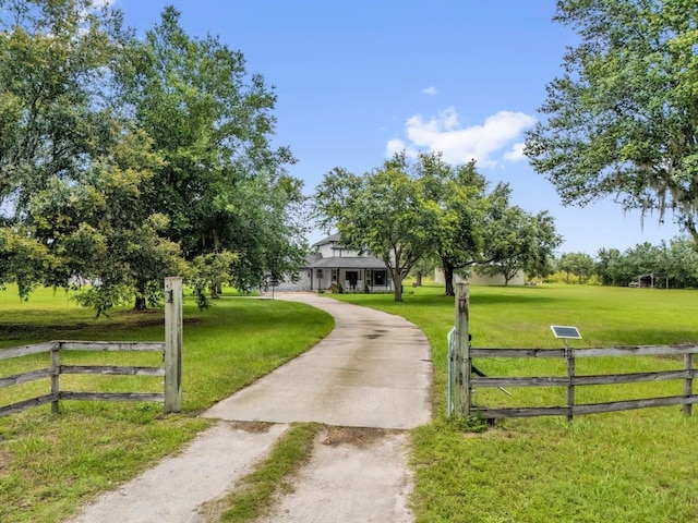 10901 Island Grove Rd, Clermont, FL 34711 - view of front of house featuring dirt driveway