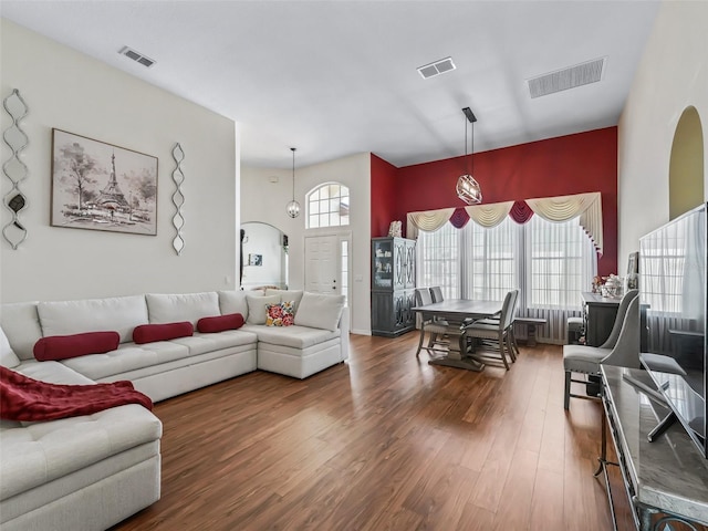 17787 SE 114th Ave, Summerfield, FL 34491 - living area with arched walkways, wood finished floors, and visible vents