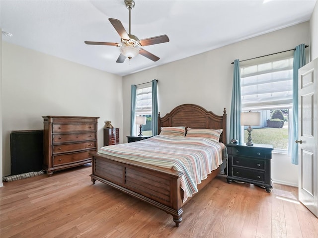 17787 SE 114th Ave, Summerfield, FL 34491 - bedroom with light wood-style flooring and ceiling fan