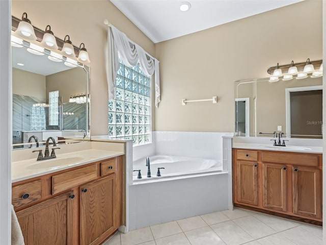 17787 SE 114th Ave, Summerfield, FL 34491 - full bath with a bath, tile patterned floors, a sink, and two vanities