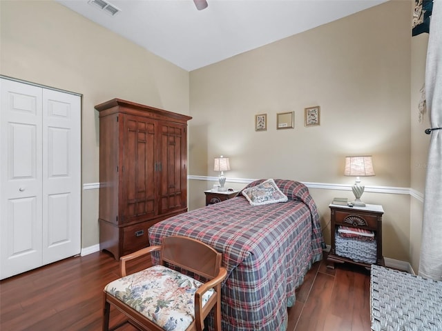 17787 SE 114th Ave, Summerfield, FL 34491 - bedroom with baseboards, visible vents, dark wood-type flooring, and a closet