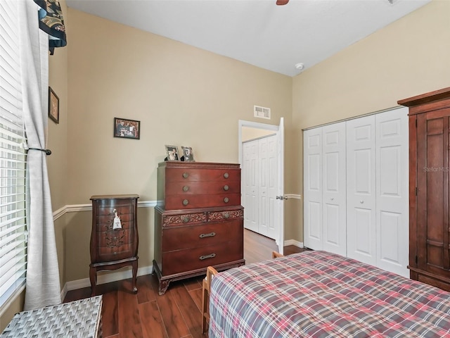 17787 SE 114th Ave, Summerfield, FL 34491 - bedroom featuring baseboards, multiple windows, wood finished floors, and visible vents
