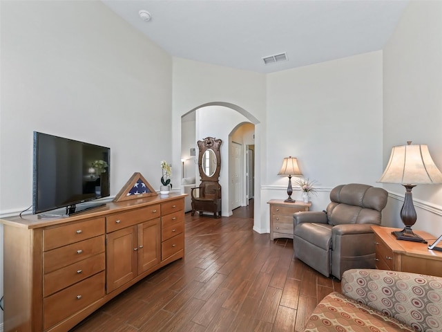 17787 SE 114th Ave, Summerfield, FL 34491 - living area with baseboards, visible vents, arched walkways, and dark wood-style floors