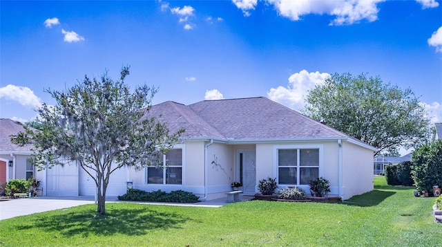 ranch-style home with stucco siding, driveway, a front yard, a garage, and a shingled roof