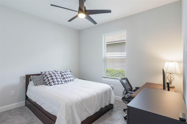 2129 Palm Tree Dr, Poinciana, FL 34759 - carpeted bedroom with a ceiling fan and baseboards
