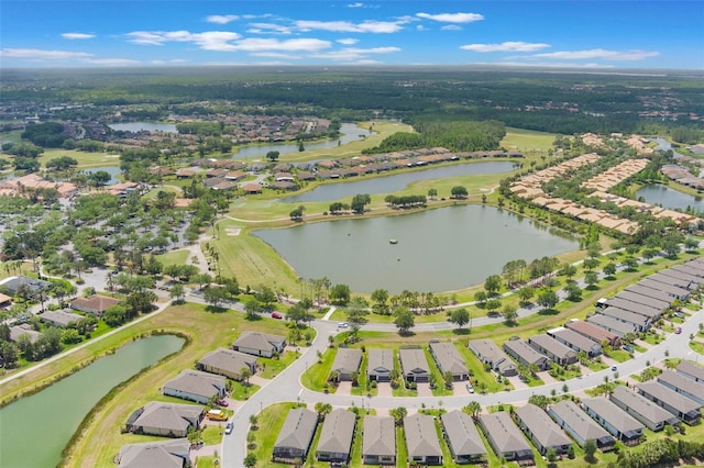 2129 Palm Tree Dr, Poinciana, FL 34759 - birds eye view of property with a residential view and a water view