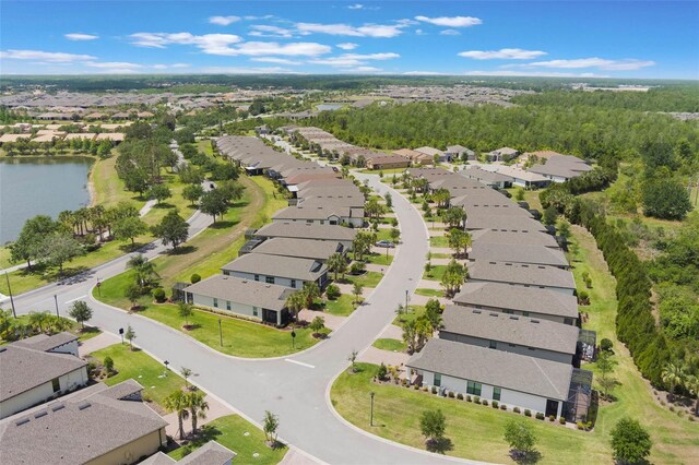 2129 Palm Tree Dr, Poinciana, FL 34759 - bird's eye view with a residential view and a water view