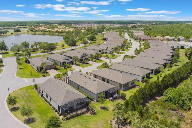 2129 Palm Tree Dr, Poinciana, FL 34759 - birds eye view of property featuring a water view and a residential view