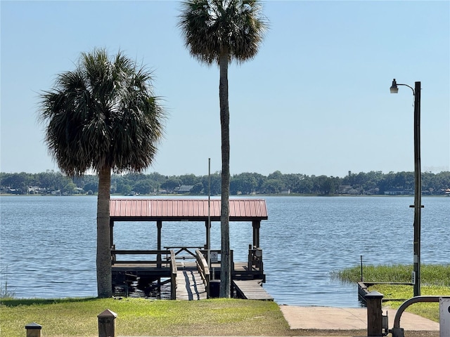 view of dock with a water view and boat lift