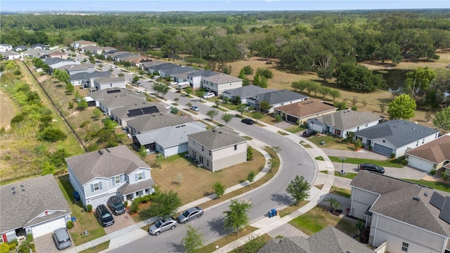 aerial view with a residential view and a forest view