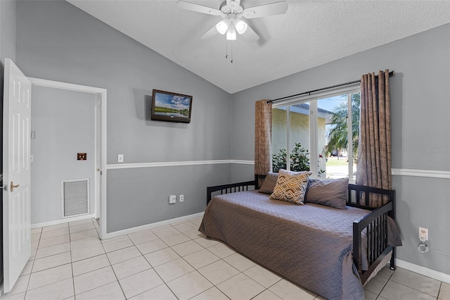 14 Clear Ct, Palm Coast, FL 32137 - bedroom with visible vents, light tile patterned floors, baseboards, a textured ceiling, and vaulted ceiling