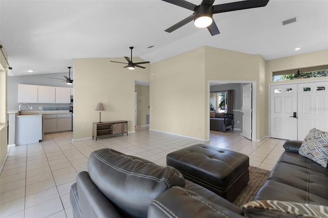 14 Clear Ct, Palm Coast, FL 32137 - living room with visible vents, baseboards, a ceiling fan, vaulted ceiling, and light tile patterned flooring