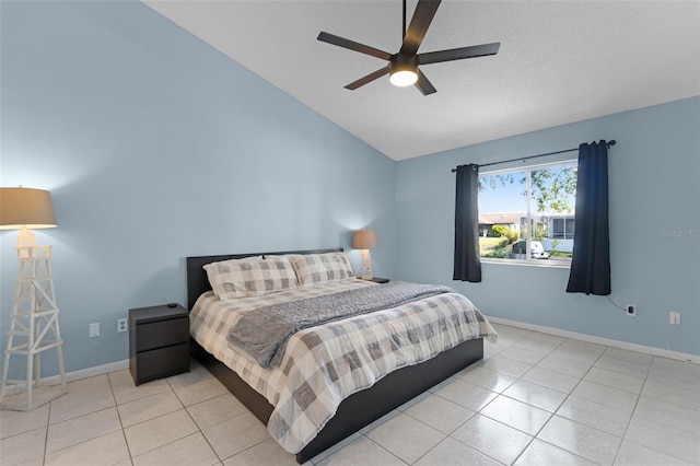 14 Clear Ct, Palm Coast, FL 32137 - bedroom featuring baseboards, ceiling fan, tile patterned flooring, and vaulted ceiling