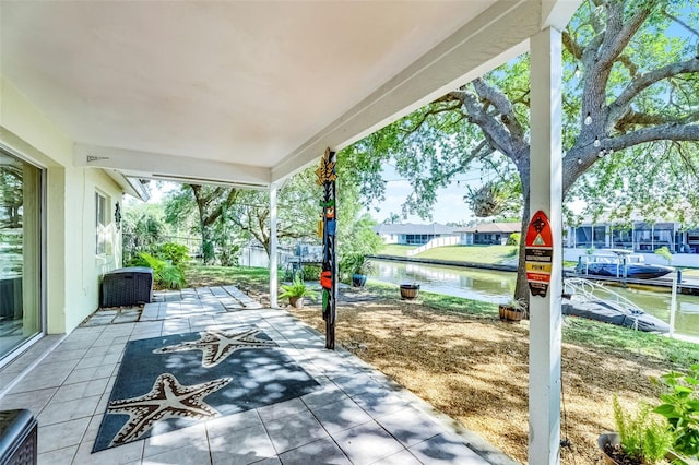 14 Clear Ct, Palm Coast, FL 32137 - view of patio featuring a water view
