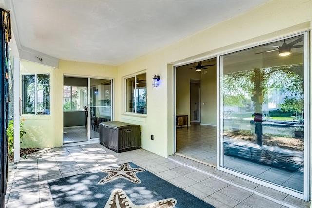 14 Clear Ct, Palm Coast, FL 32137 - exterior space with a ceiling fan and a healthy amount of sunlight