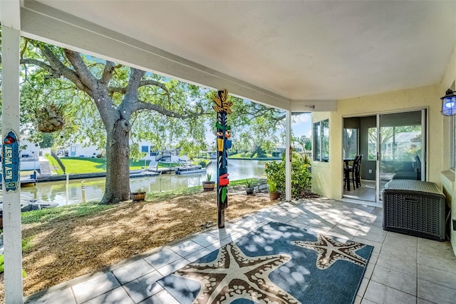 14 Clear Ct, Palm Coast, FL 32137 - view of patio / terrace with a water view