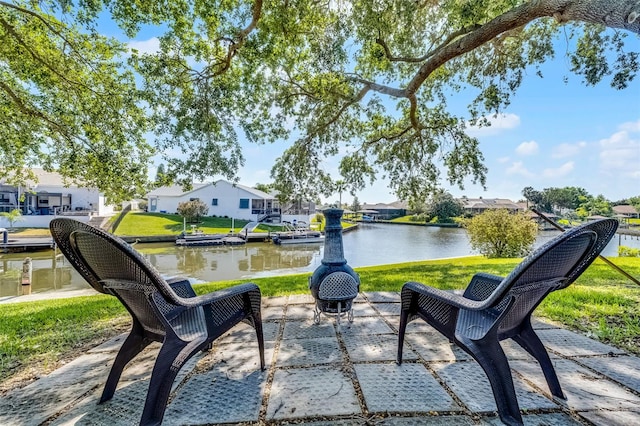 14 Clear Ct, Palm Coast, FL 32137 - view of property's community with a water view, a patio area, a residential view, and a yard