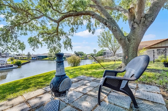 14 Clear Ct, Palm Coast, FL 32137 - view of patio featuring a water view and a residential view