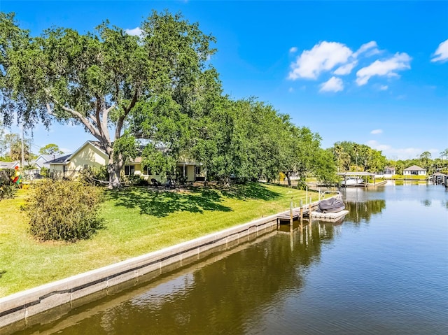 14 Clear Ct, Palm Coast, FL 32137 - property view of water featuring a boat dock