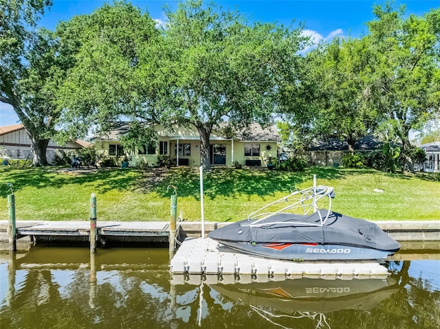 14 Clear Ct, Palm Coast, FL 32137 - view of dock with a water view and a lawn