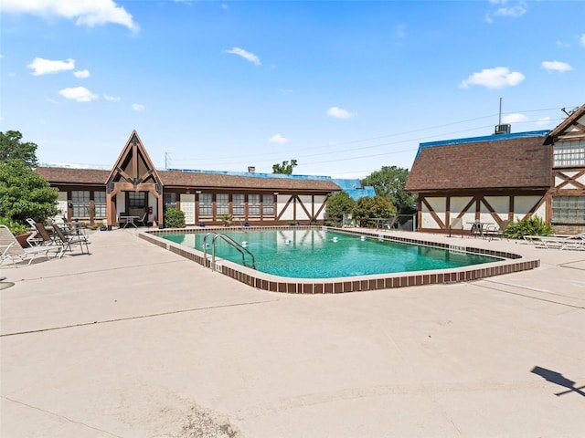 community pool featuring a patio
