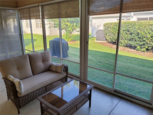 sunroom / solarium featuring outdoor lounge area