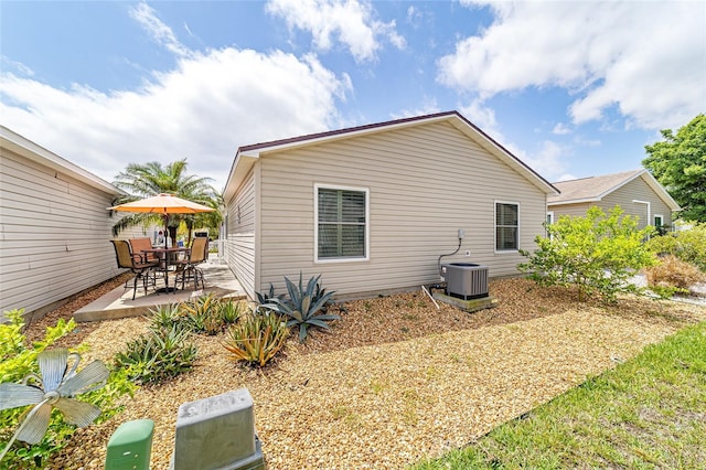2095 Thornton Ter, The Villages, FL 32162 - rear view of house featuring a patio and central AC