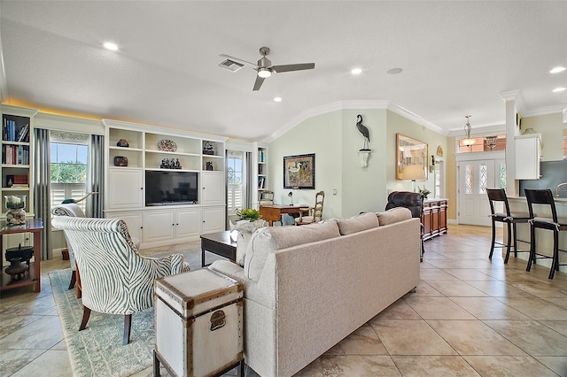 living area featuring visible vents, recessed lighting, lofted ceiling, a ceiling fan, and crown molding