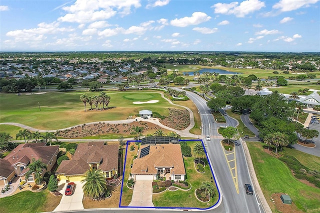birds eye view of property featuring a residential view, a water view, and golf course view