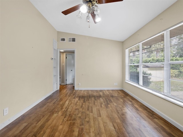 25519 Colmar Ave, Sorrento, FL 32776 - unfurnished room featuring ceiling fan, wood-type flooring, lofted ceiling, and baseboards