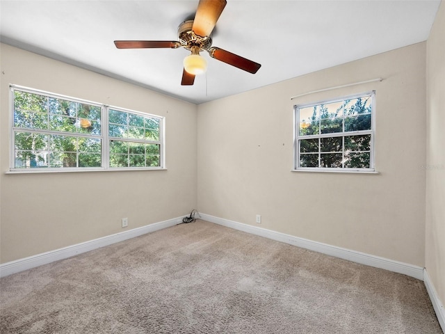 25519 Colmar Ave, Sorrento, FL 32776 - carpeted empty room featuring baseboards and a ceiling fan