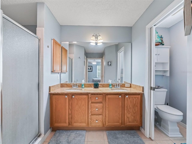 9621 SE 168th Maplesong Ln, The Villages, FL 32162 - bathroom with a sink, a stall shower, and double vanity