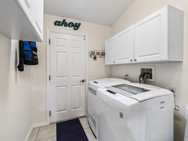 9621 SE 168th Maplesong Ln, The Villages, FL 32162 - laundry area with cabinet space, baseboards, light tile patterned floors, and washer and dryer