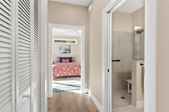12129 Grand Oak Ln, Oxford, FL 34484 - corridor featuring baseboards and wood finished floors