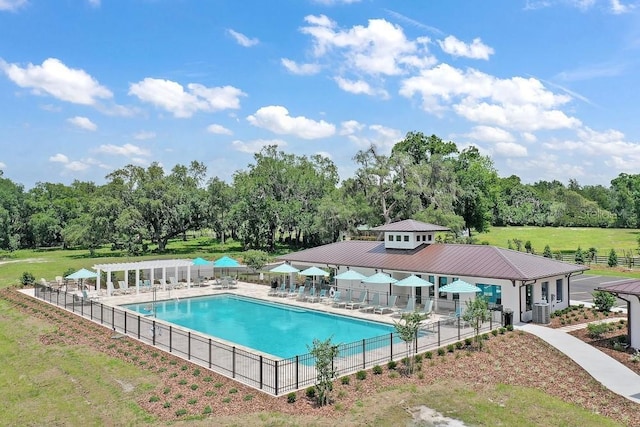 12129 Grand Oak Ln, Oxford, FL 34484 - pool featuring fence and a pergola