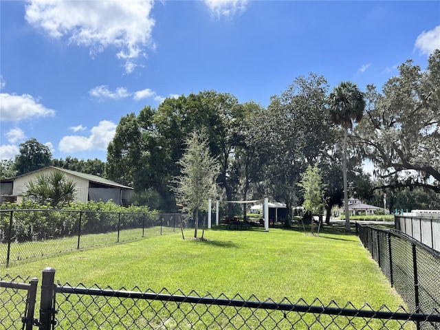 12129 Grand Oak Ln, Oxford, FL 34484 - view of yard with fence