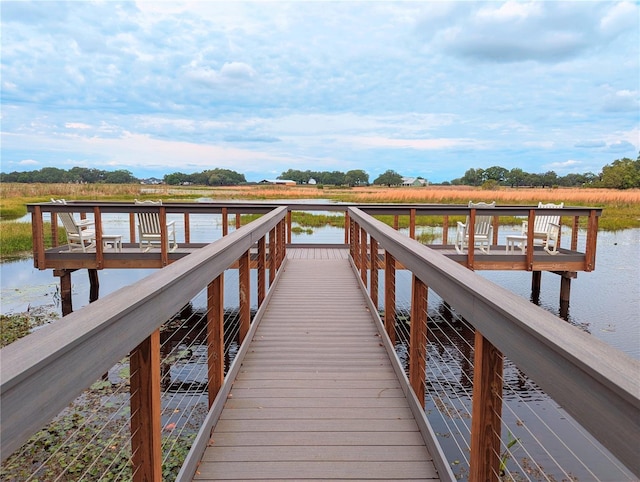 12129 Grand Oak Ln, Oxford, FL 34484 - view of dock with a water view