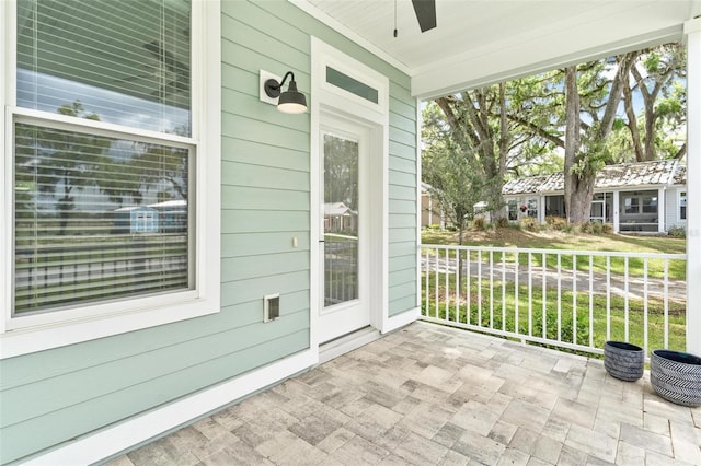 12129 Grand Oak Ln, Oxford, FL 34484 - view of patio featuring a porch and a ceiling fan